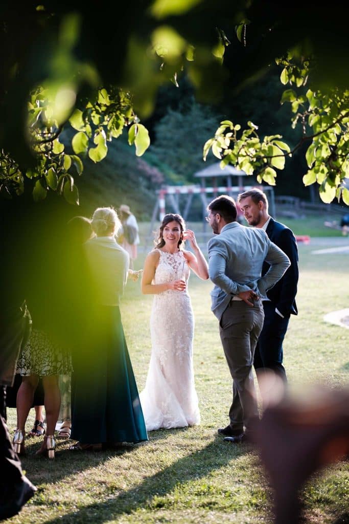 the bride enjoying a ray of sunshine during her wedding in Chamonix